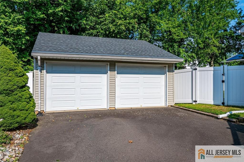 20 Melville Road Edison, NJ 08817 - Photo 28 of 31 a house with trees in the background