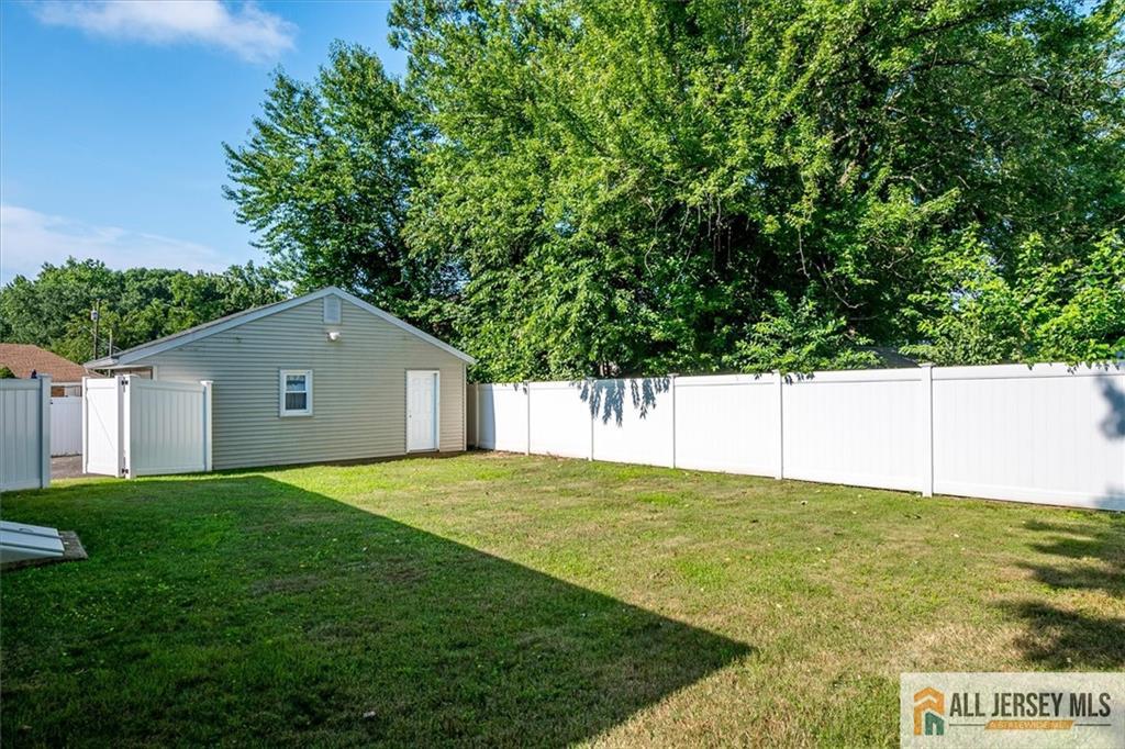 20 Melville Road Edison, NJ 08817 - Photo 30 of 31 a view of an house with a yard