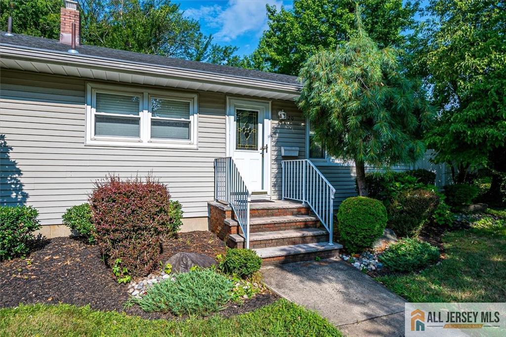 20 Melville Road Edison, NJ 08817 - Photo 5 of 31 a view of a house with a yard