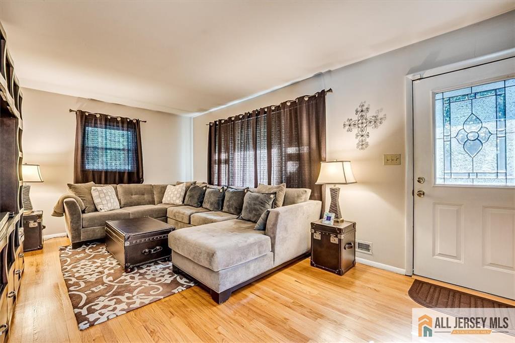 20 Melville Road Edison, NJ 08817 - Photo 6 of 31 a living room with furniture and a window