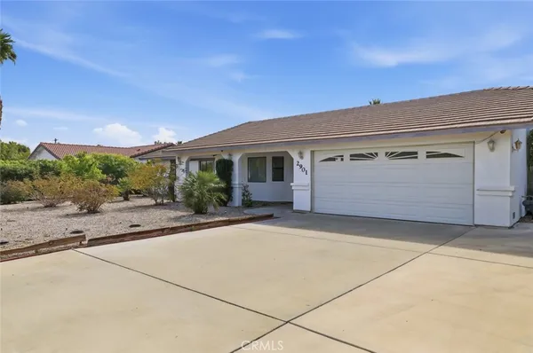 a house view with a outdoor space