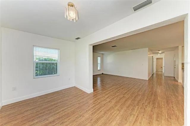 a view of a livingroom and a hallway