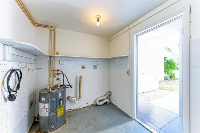 a view of yard with swimming pool and green space