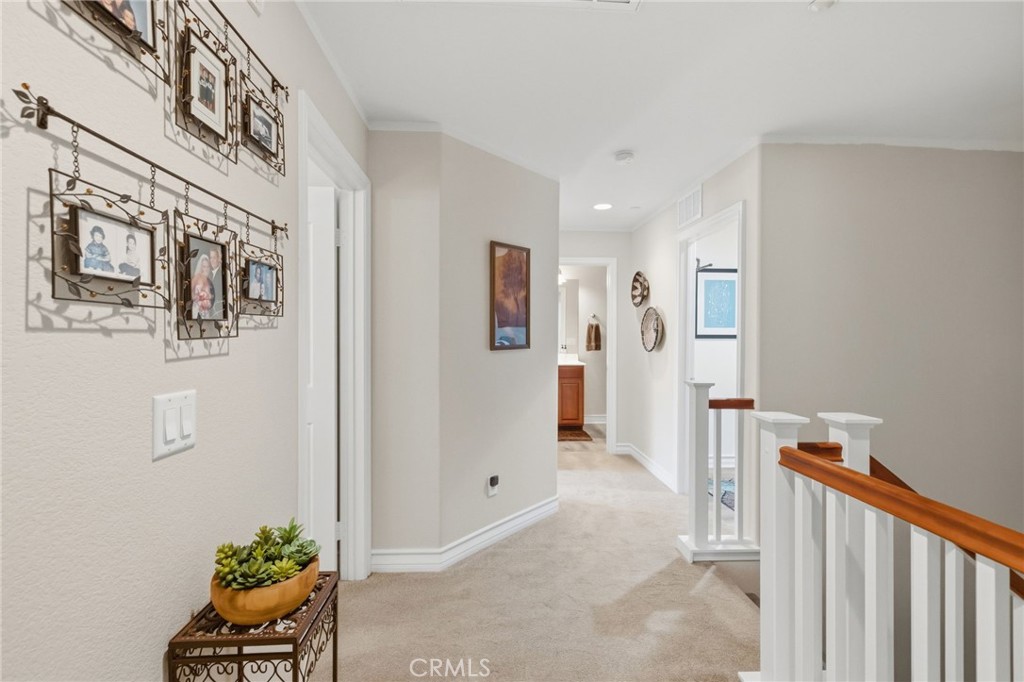 7331 Shelby Place, Unit 84 Rancho Cucamonga, CA 91739 - Photo 19 of 43 a view of a hallway to a livingroom with furniture