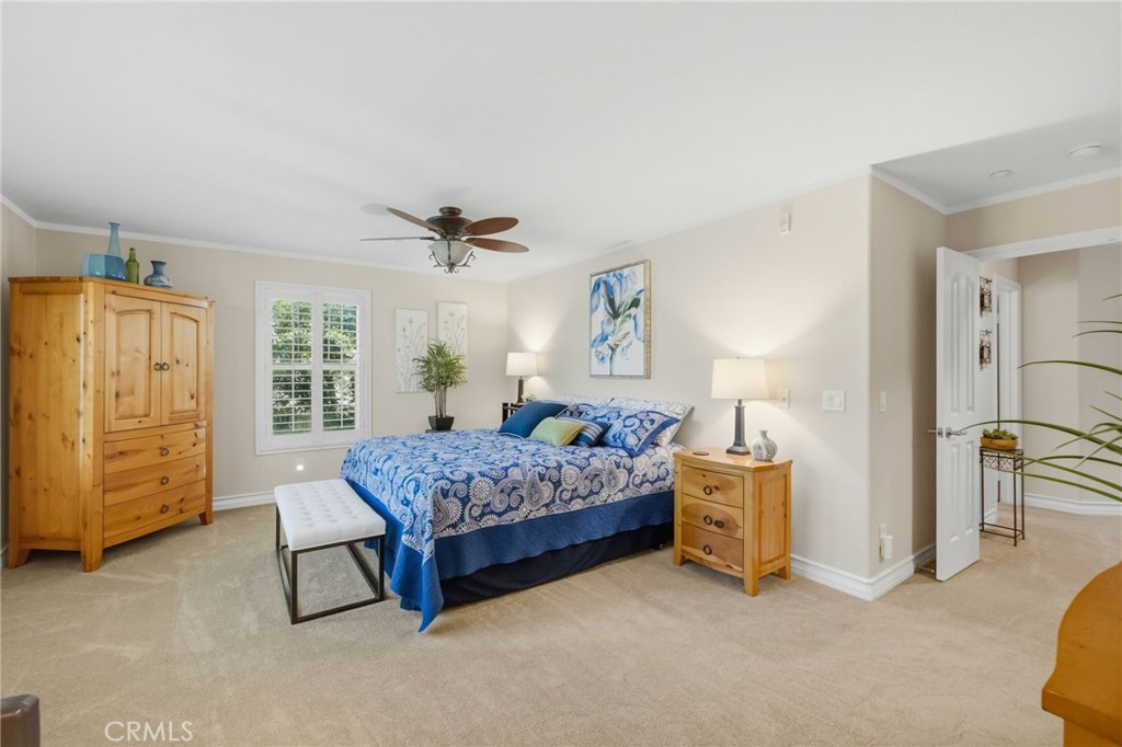 7331 Shelby Place, Unit 84 Rancho Cucamonga, CA 91739 - Photo 22 of 43 a bedroom with a bed and a cabinets