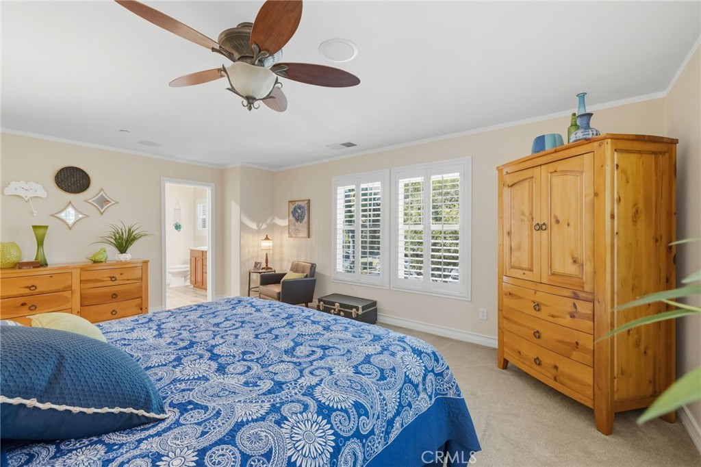 7331 Shelby Place, Unit 84 Rancho Cucamonga, CA 91739 - Photo 23 of 43 a bedroom with a bed and a dresser