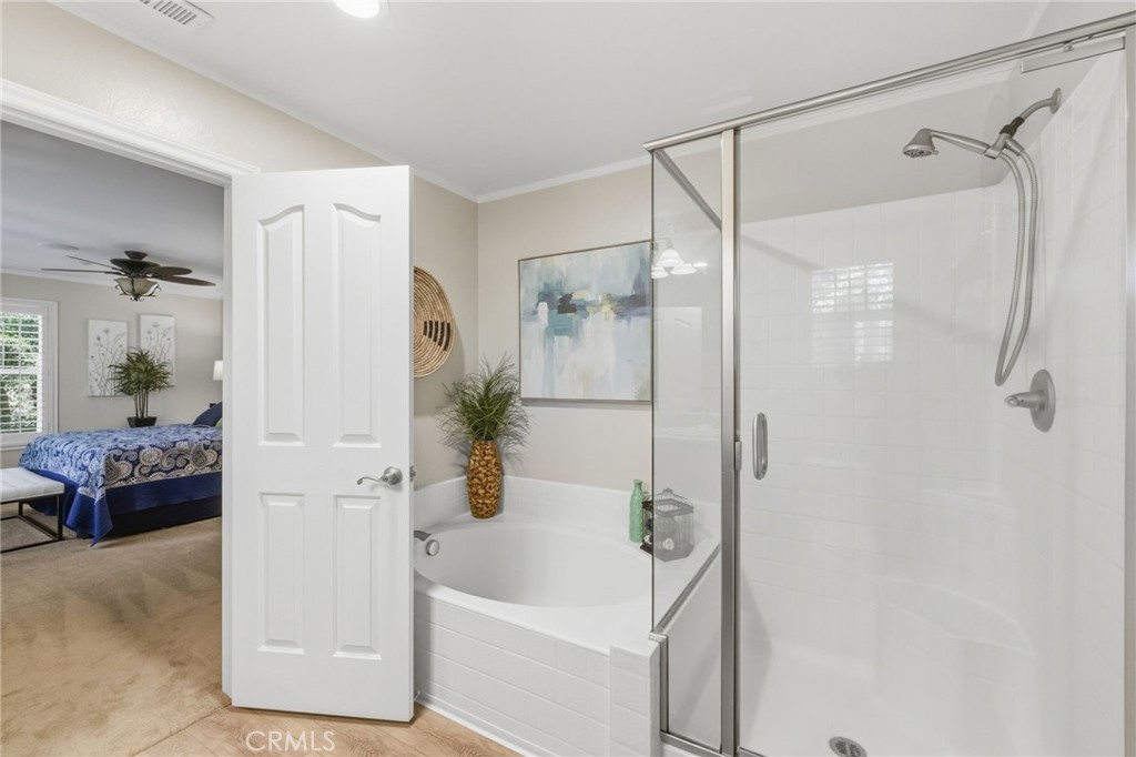 7331 Shelby Place, Unit 84 Rancho Cucamonga, CA 91739 - Photo 26 of 43 a bathroom with a tub shower and a sink