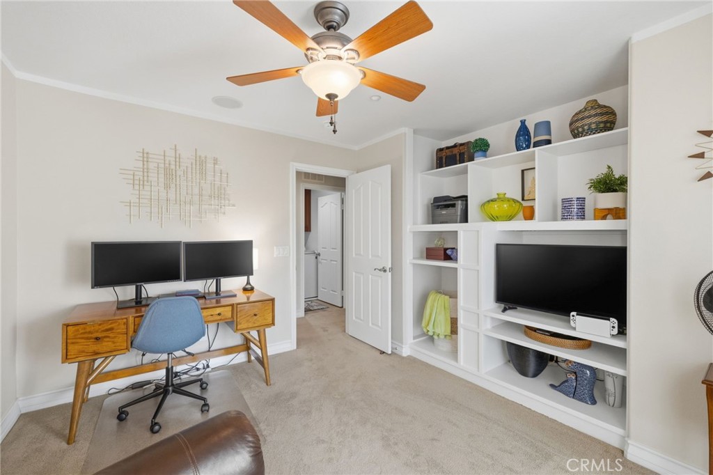 7331 Shelby Place, Unit 84 Rancho Cucamonga, CA 91739 - Photo 30 of 43 a living room with furniture and a flat screen tv