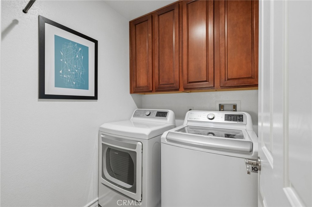 7331 Shelby Place, Unit 84 Rancho Cucamonga, CA 91739 - Photo 34 of 43 a utility room with dryer and washer