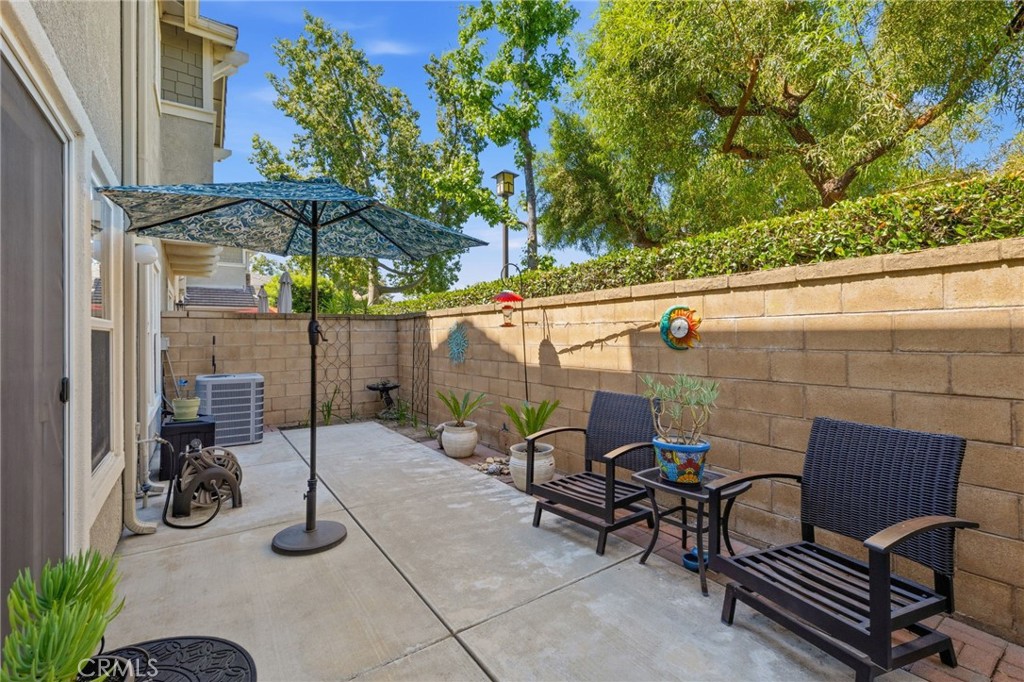 7331 Shelby Place, Unit 84 Rancho Cucamonga, CA 91739 - Photo 35 of 43 a view of a backyard with sitting area and furniture