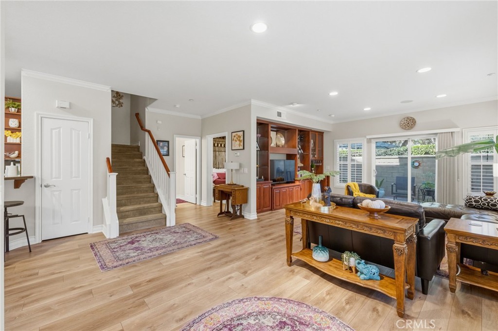 7331 Shelby Place, Unit 84 Rancho Cucamonga, CA 91739 - Photo 5 of 43 a room with furniture and a wooden floor