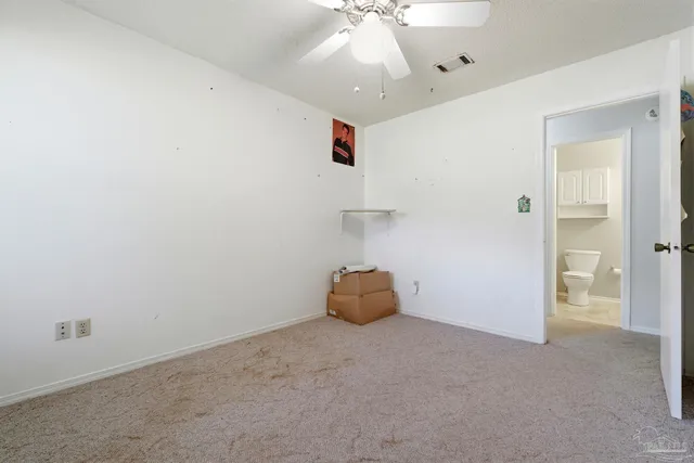 a bathroom with a toilet sink and a shower