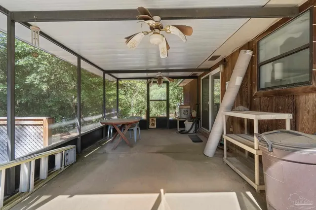 a view of a porch with furniture