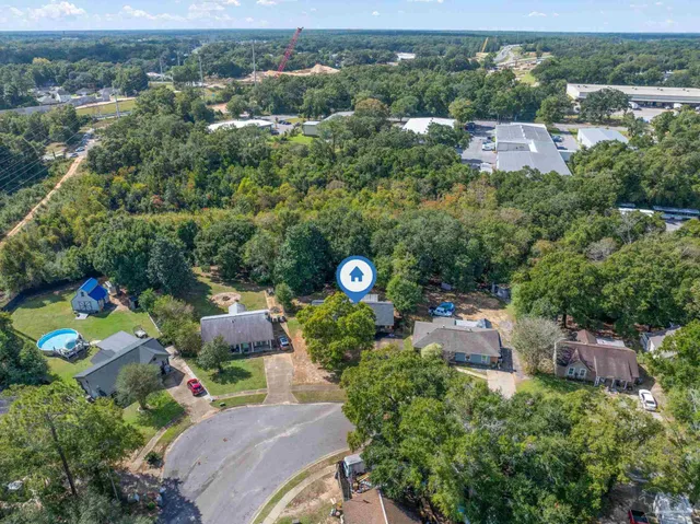 an aerial view of residential house with outdoor space