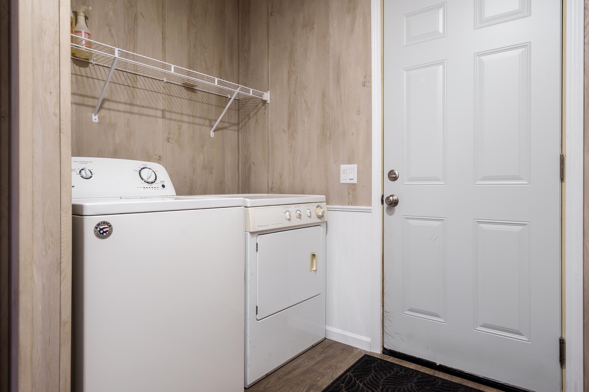 11447 South County Rd K Beloit, WI 53511 - Photo 25 of 51 a utility room with dryer and washer