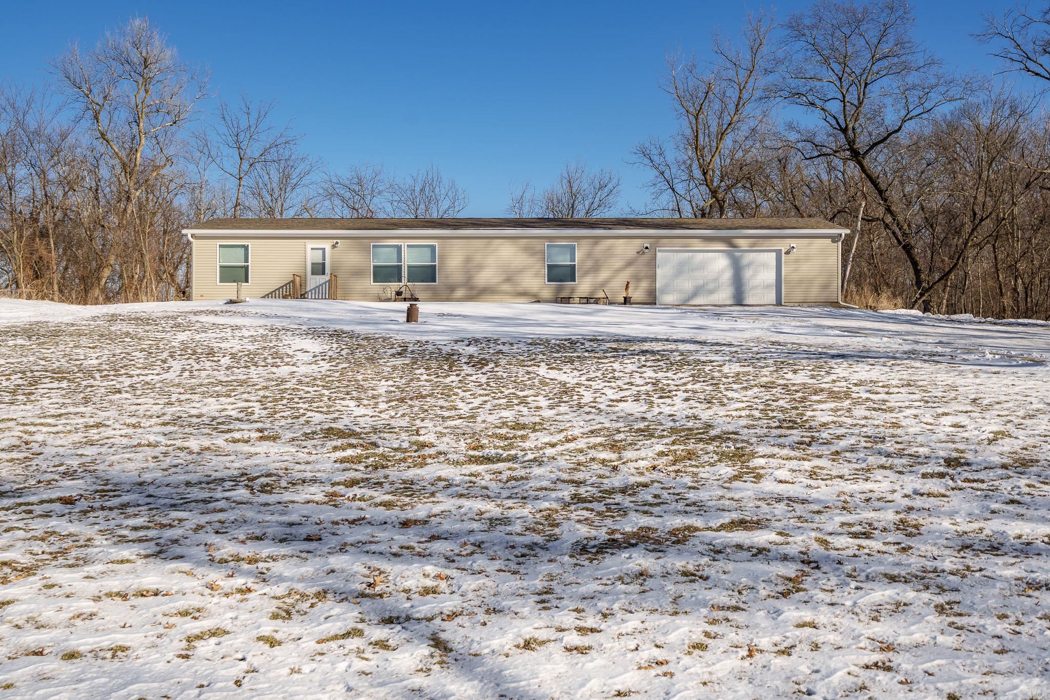 11447 South County Rd K Beloit, WI 53511 - Photo 51 of 51 a view of a house with a yard