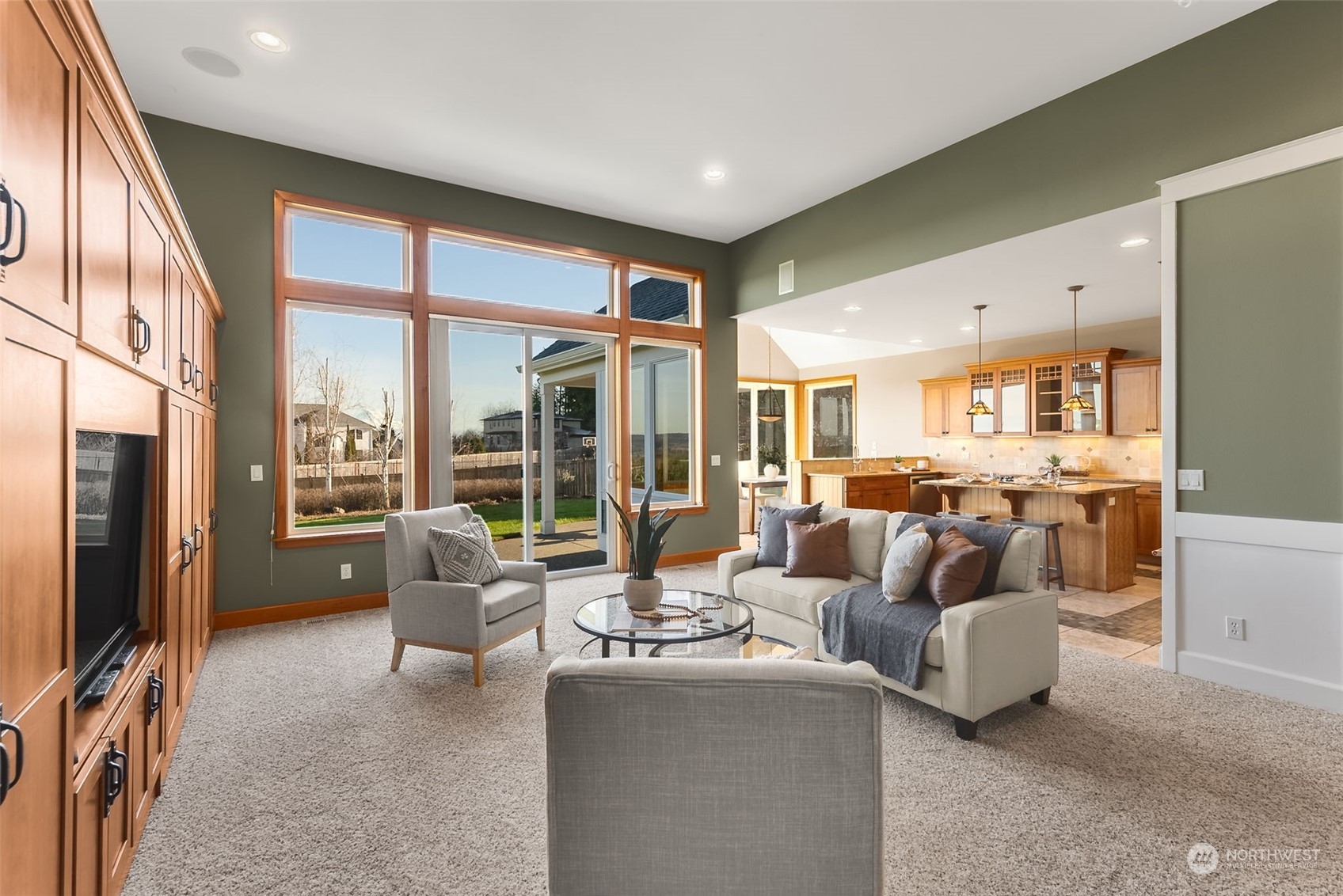 9306 Milburn Loop Southeast Olympia, WA 98513 - Photo 12 of 40 a living room with fireplace furniture and a large window
