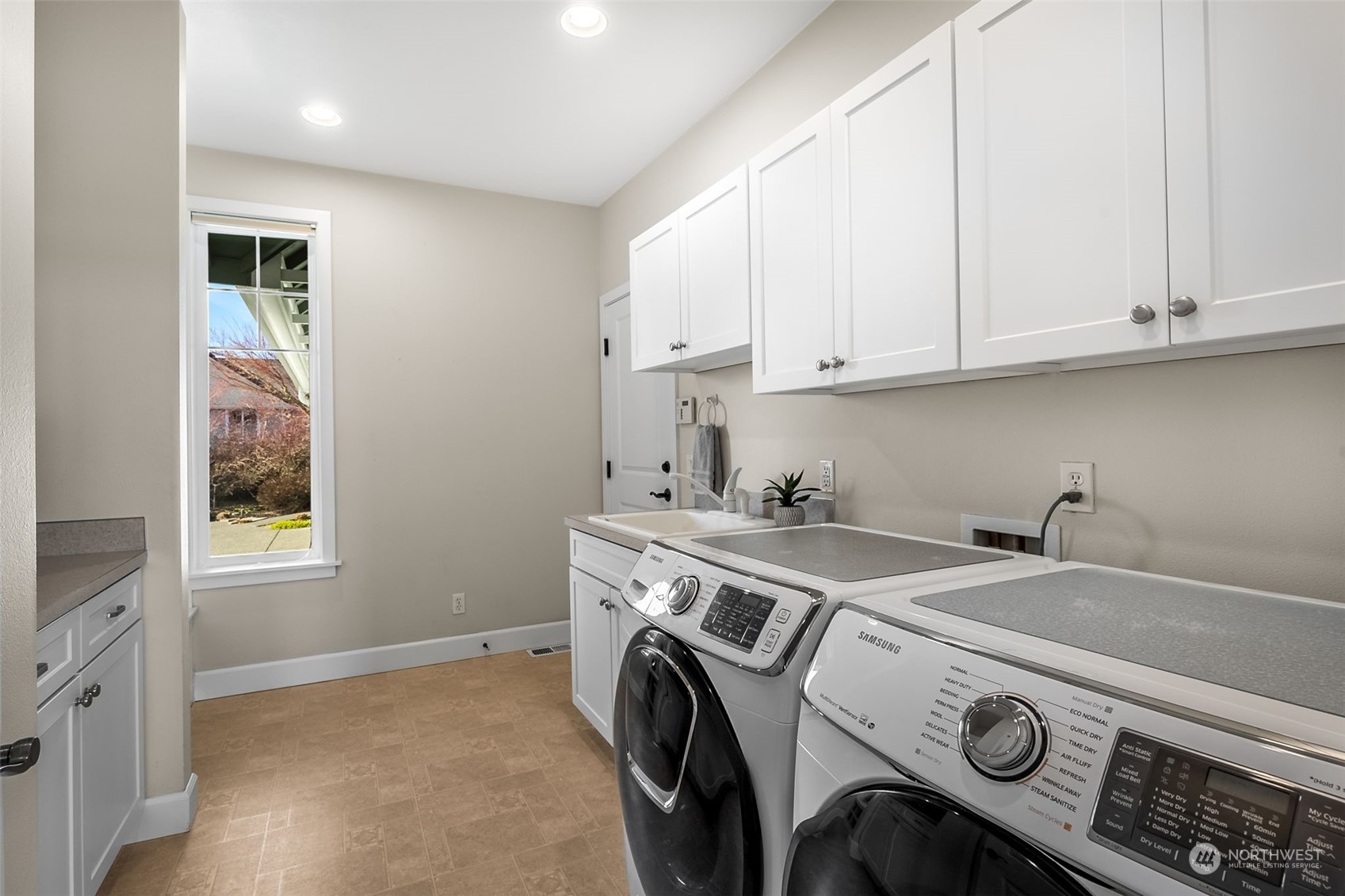9306 Milburn Loop Southeast Olympia, WA 98513 - Photo 25 of 40 a utility room with dryer and washer