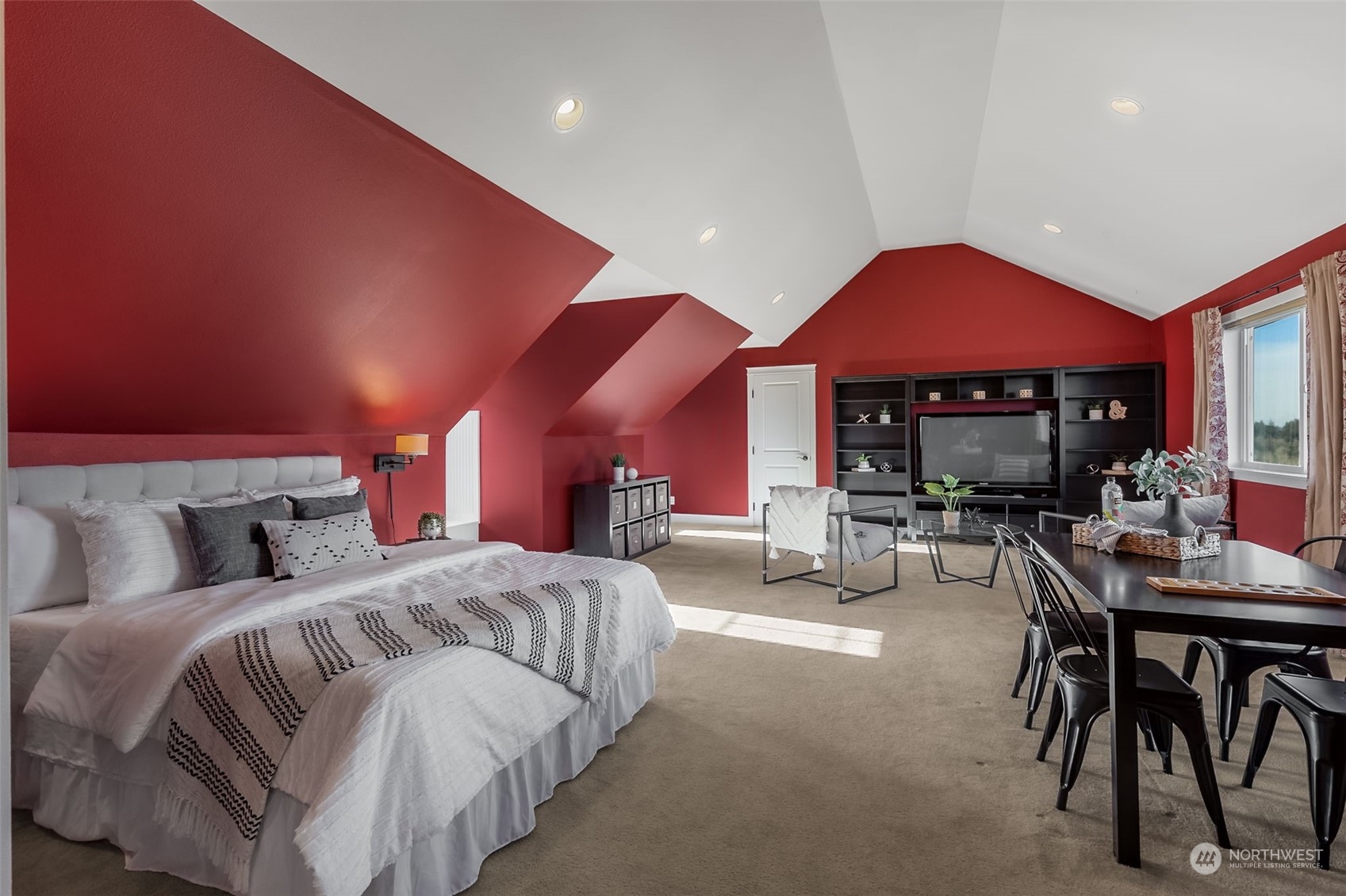 9306 Milburn Loop Southeast Olympia, WA 98513 - Photo 27 of 40 a bedroom with furniture and a large window