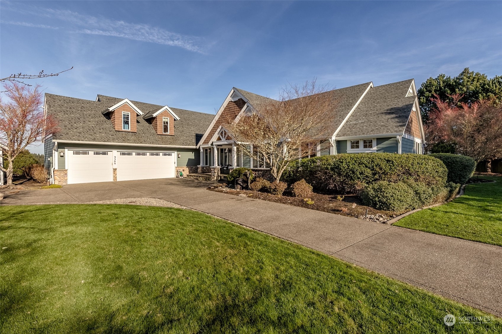 9306 Milburn Loop Southeast Olympia, WA 98513 - Photo 29 of 40 a front view of a house with a yard
