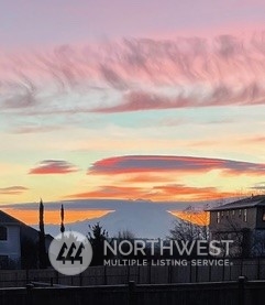 9306 Milburn Loop Southeast Olympia, WA 98513 - Photo 40 of 40 a view of a city and sunset