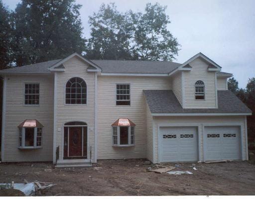 262 Stonehouse Road Trumbull, CT 06611 - Photo 1 of 1 a front view of a house with a yard