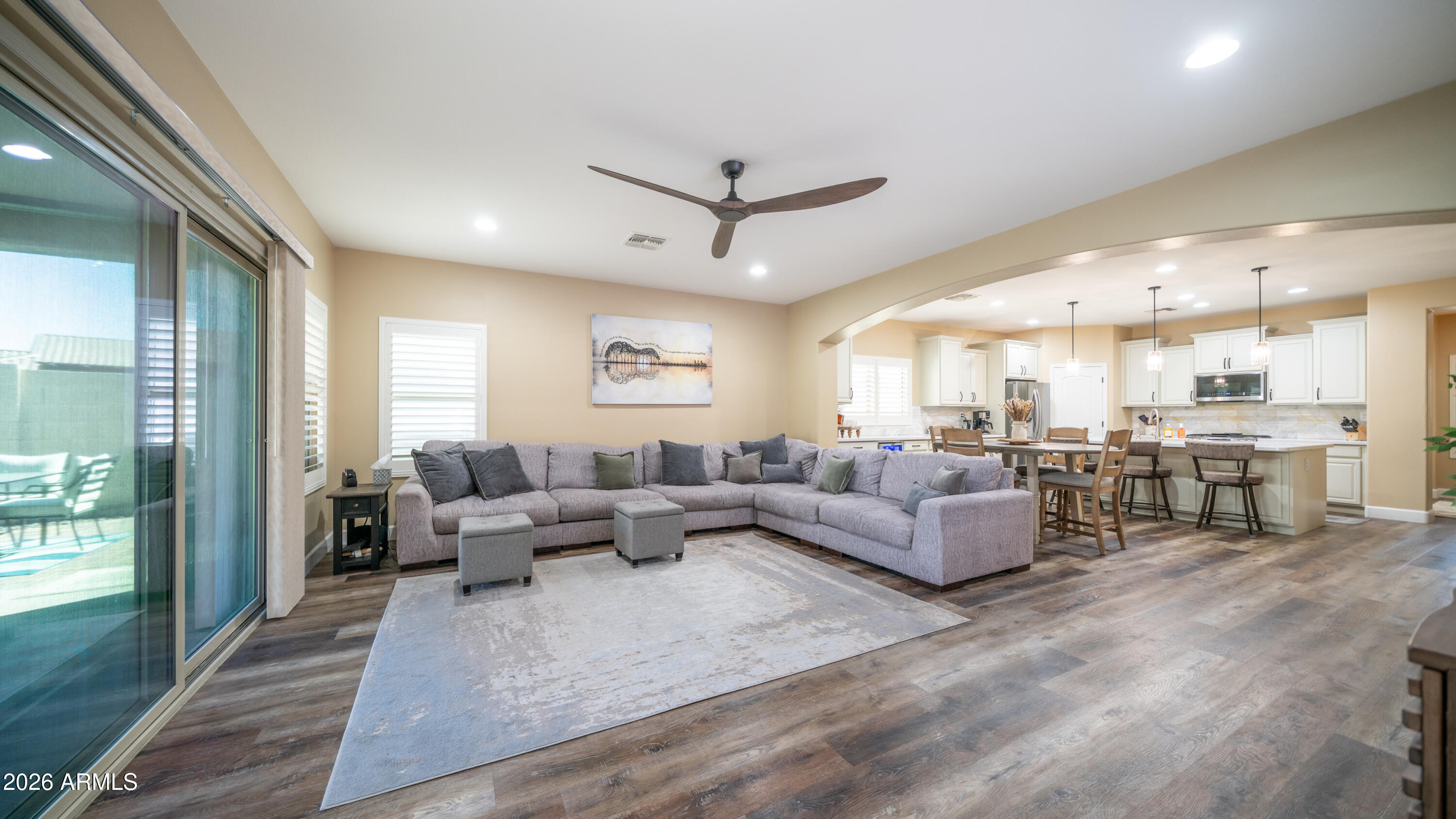 10754 West Yearling Road Peoria, AZ 85383 - Photo 14 of 35 a living room with furniture and a large window
