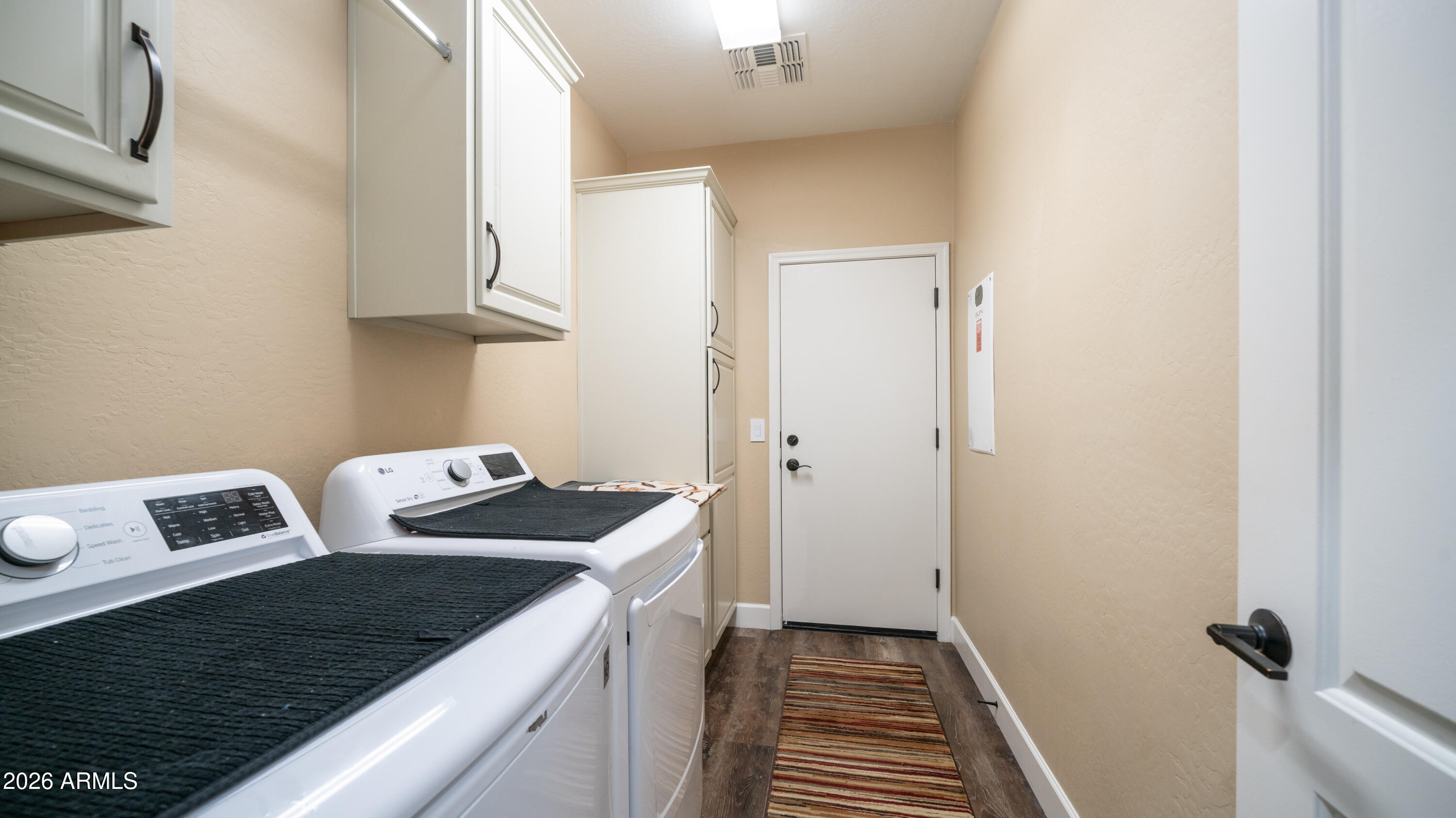 10754 West Yearling Road Peoria, AZ 85383 - Photo 26 of 35 a view of kitchen and utility