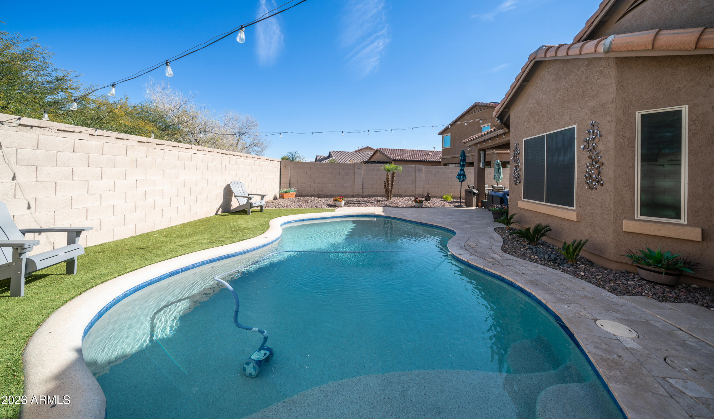 10754 West Yearling Road Peoria, AZ 85383 - Photo 33 of 35 a view of a house with backyard