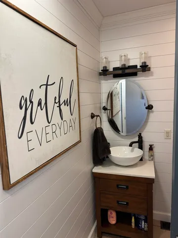 a view of a livingroom with furniture and windows