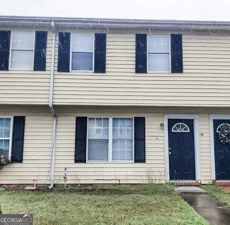 a front view of a white house