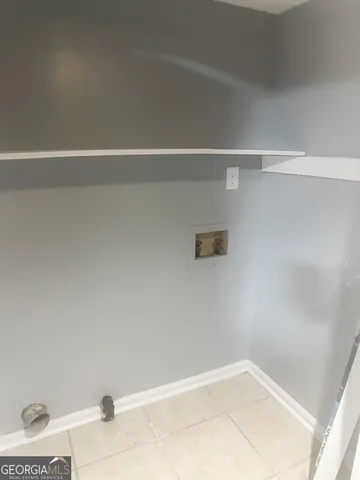 a view of a refrigerator with white paint