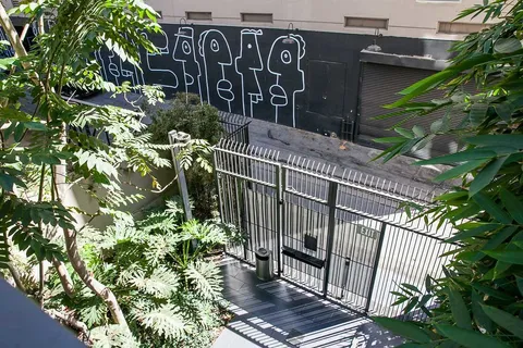 a view of a hallway with a chandelier