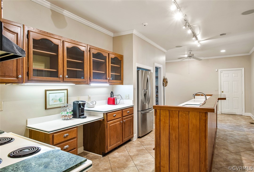4019 Belspring Road Chester, VA 23831 - Photo 11 of 46 a kitchen that has a sink stainless steel appliances a counter space and a window