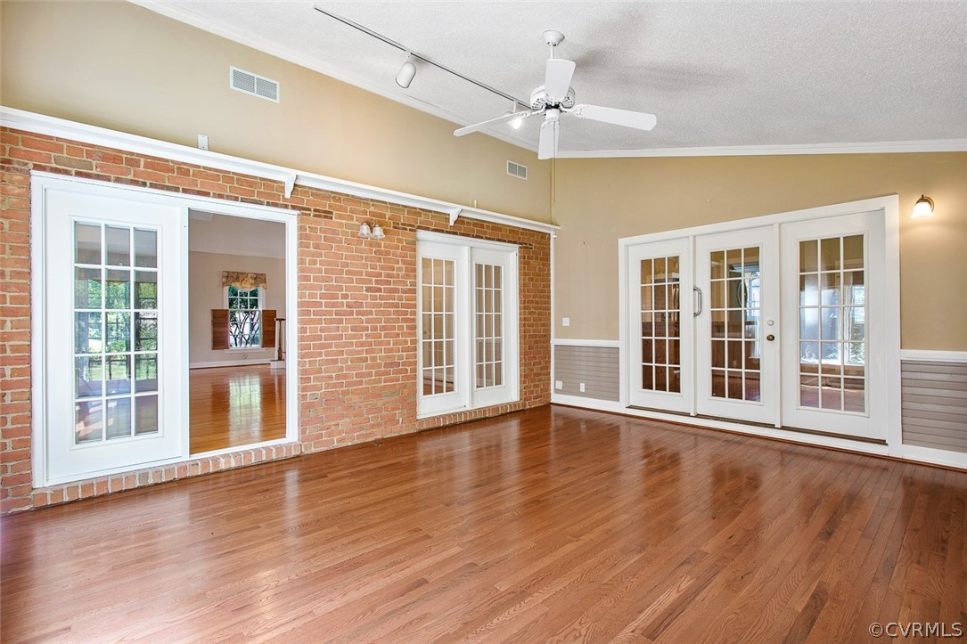 4019 Belspring Road Chester, VA 23831 - Photo 18 of 46 a view of an empty room with wooden floor and a window