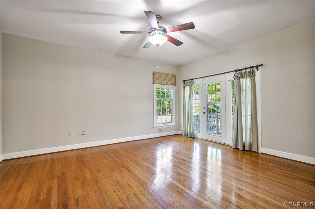 4019 Belspring Road Chester, VA 23831 - Photo 20 of 46 an empty room with wooden floor and windows