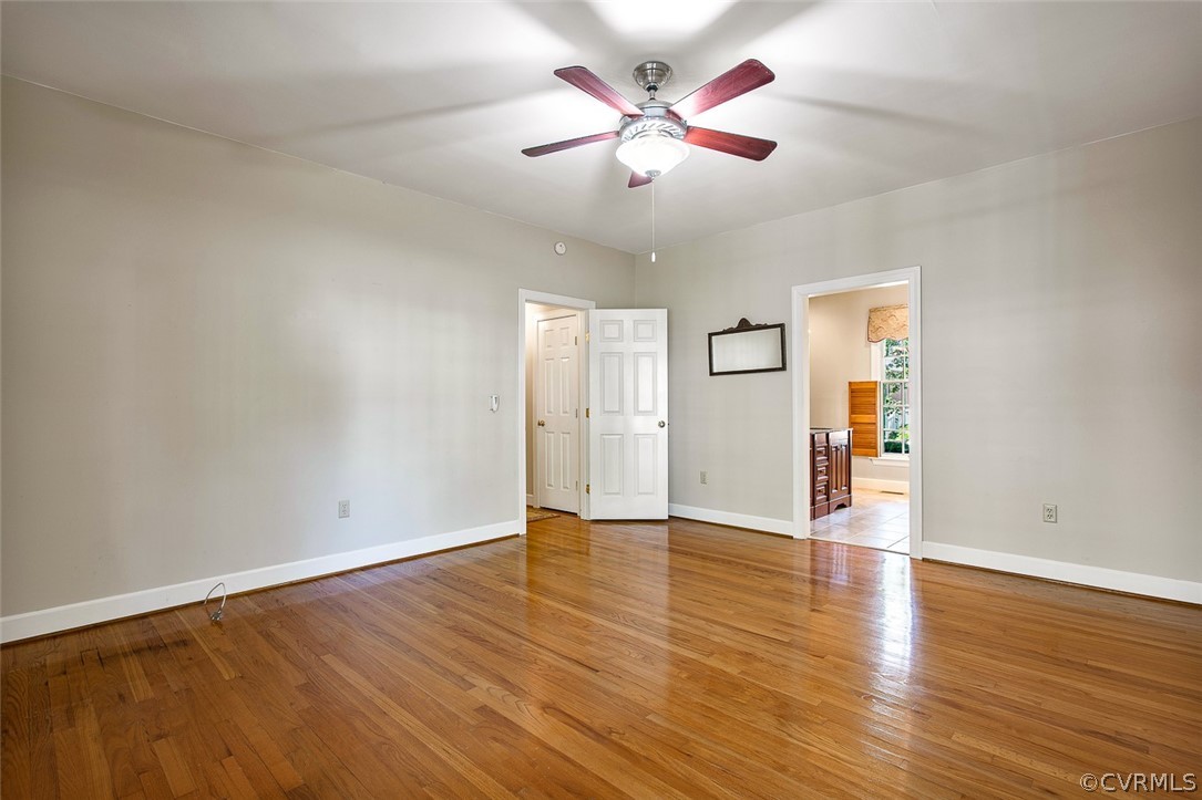 4019 Belspring Road Chester, VA 23831 - Photo 21 of 46 an empty room with wooden floor and windows