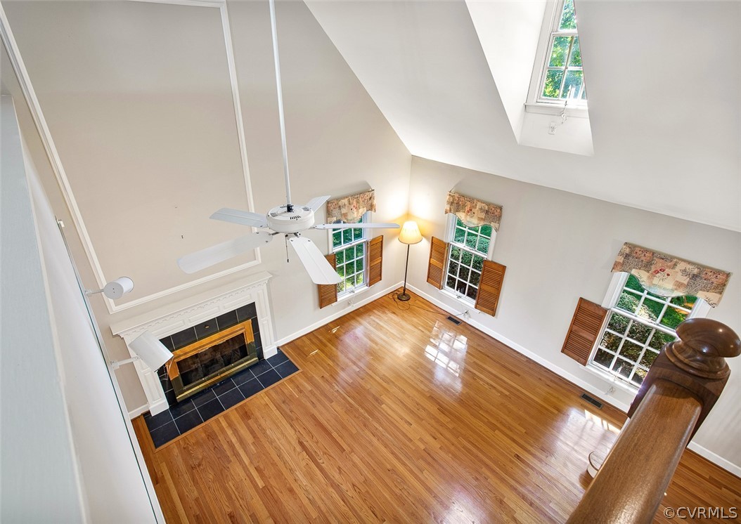 4019 Belspring Road Chester, VA 23831 - Photo 26 of 46 a living room with furniture and a wooden floor