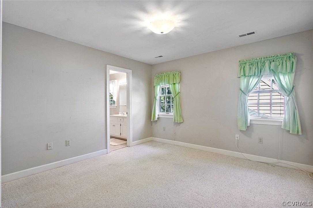 4019 Belspring Road Chester, VA 23831 - Photo 28 of 46 an empty room with windows and closet