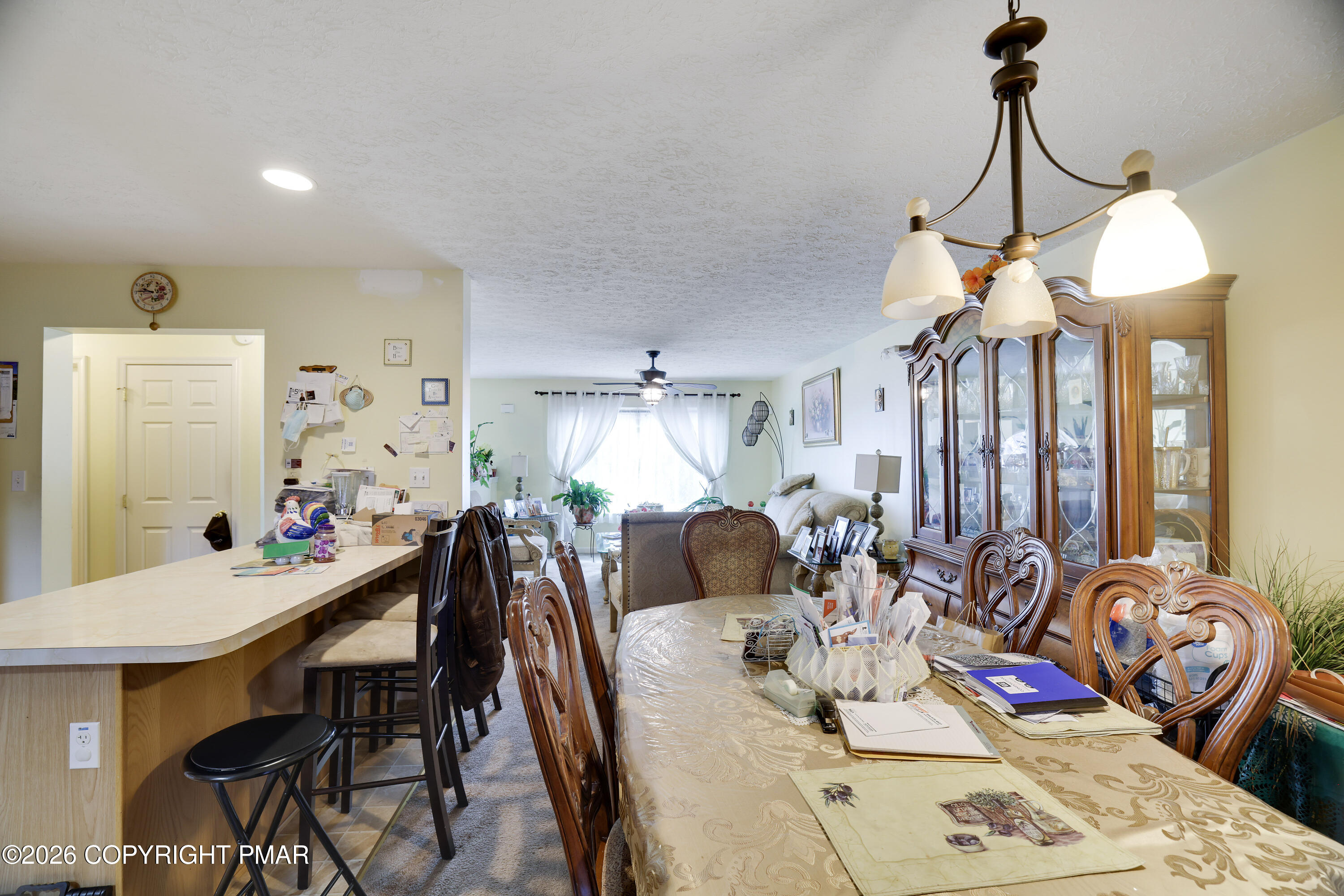 2137 Freedom Way Pocono Summit, PA 18346 - Photo 8 of 71 a view of a dining room with furniture