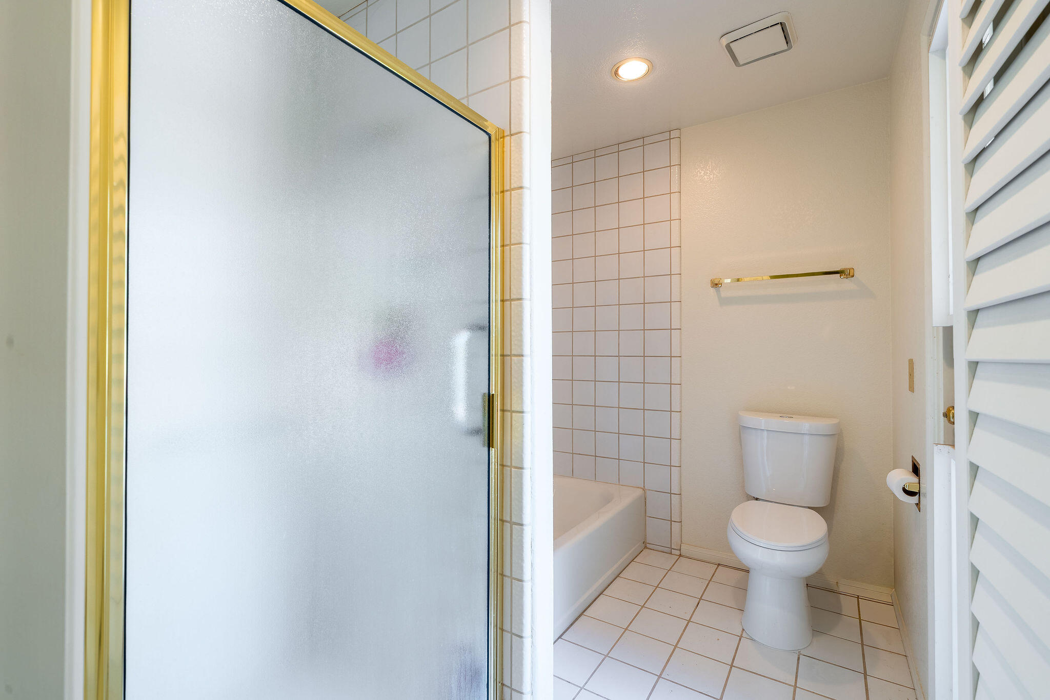 82151 Hanson Drive Indio, CA 92201 - Photo 19 of 38 a bathroom with a toilet and a shower