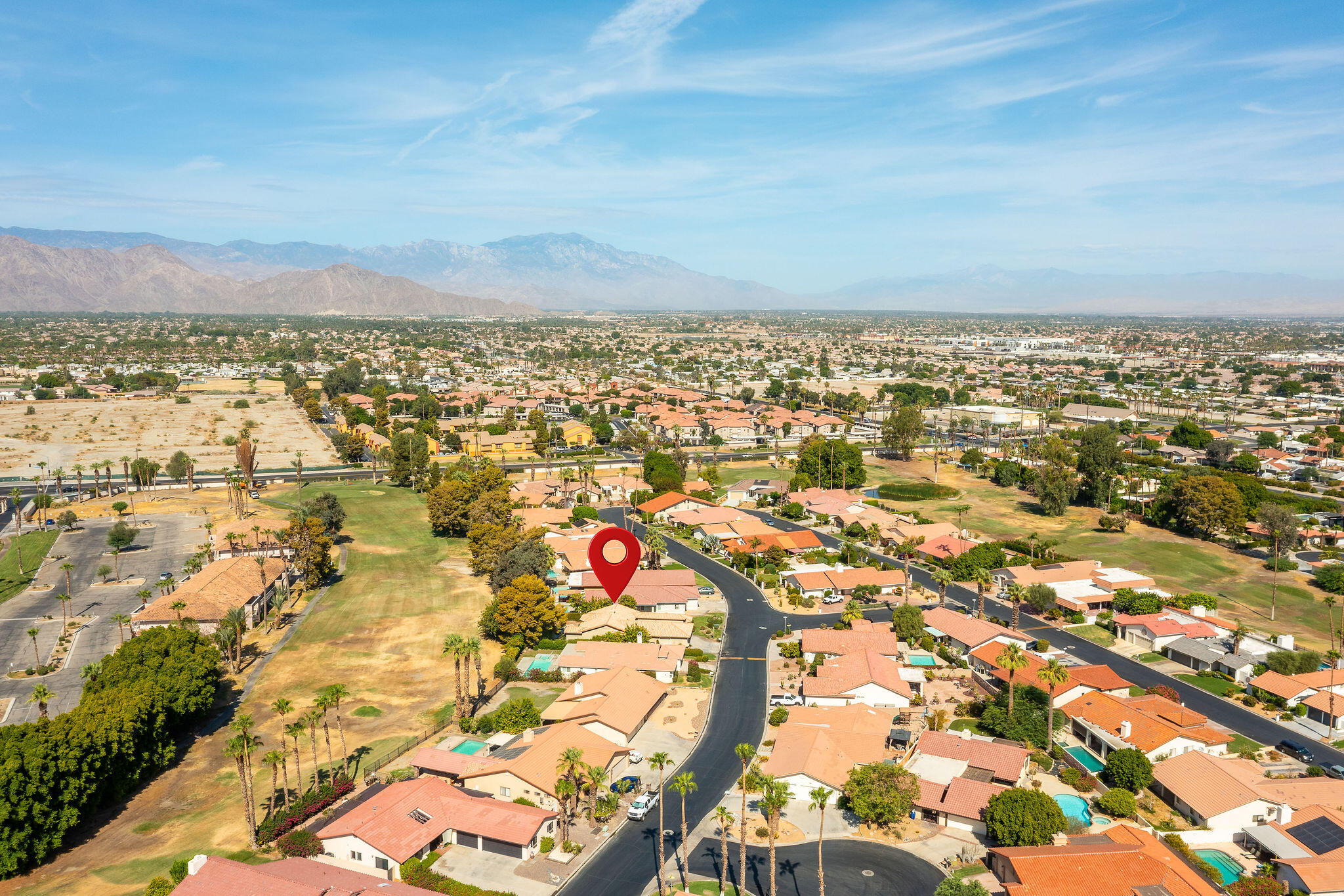 82151 Hanson Drive Indio, CA 92201 - Photo 37 of 38 an aerial view of residential building and city view