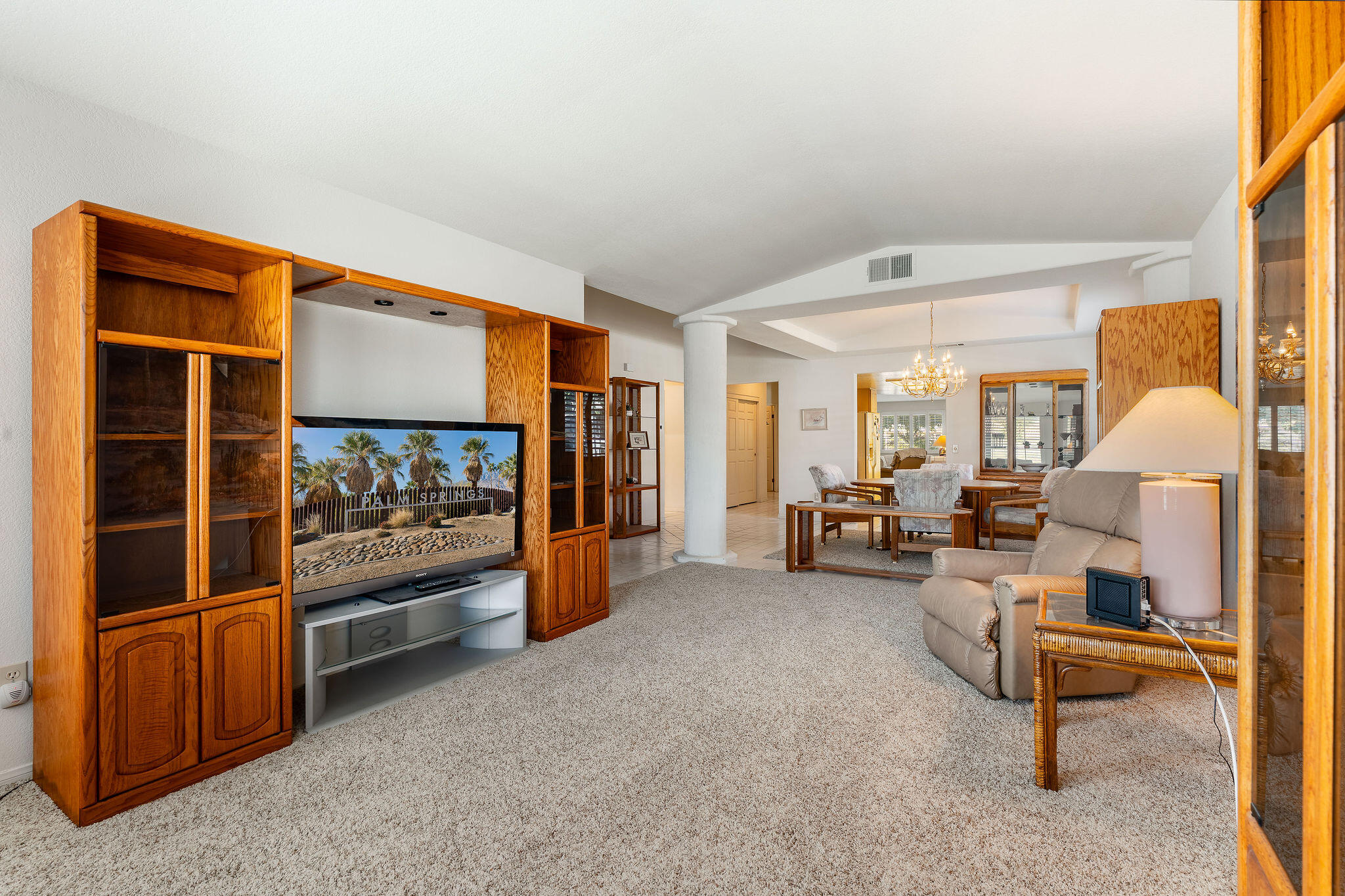82151 Hanson Drive Indio, CA 92201 - Photo 5 of 38 a living room with furniture and a flat screen tv