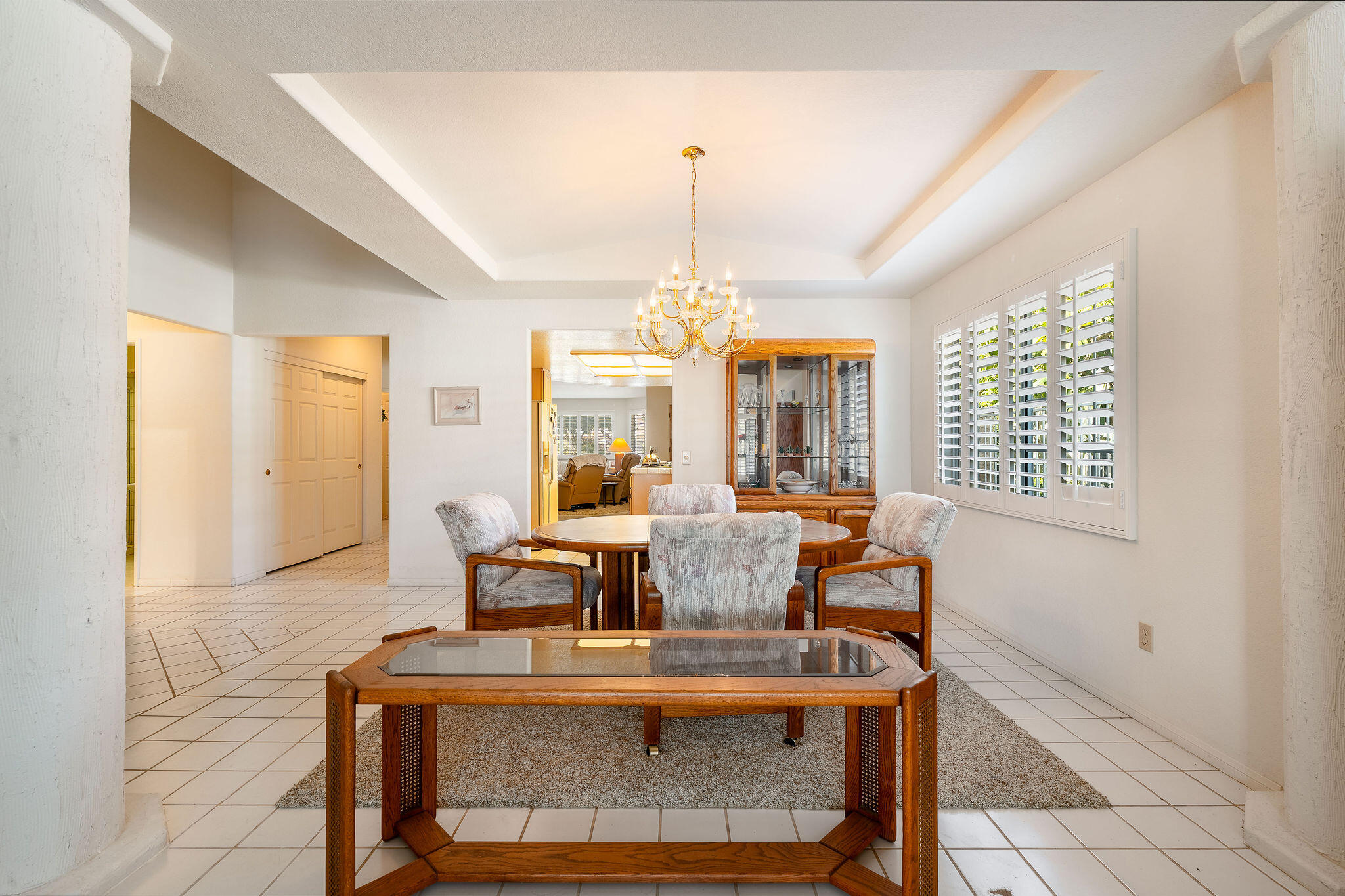 82151 Hanson Drive Indio, CA 92201 - Photo 6 of 38 a living room with dining table and a large window