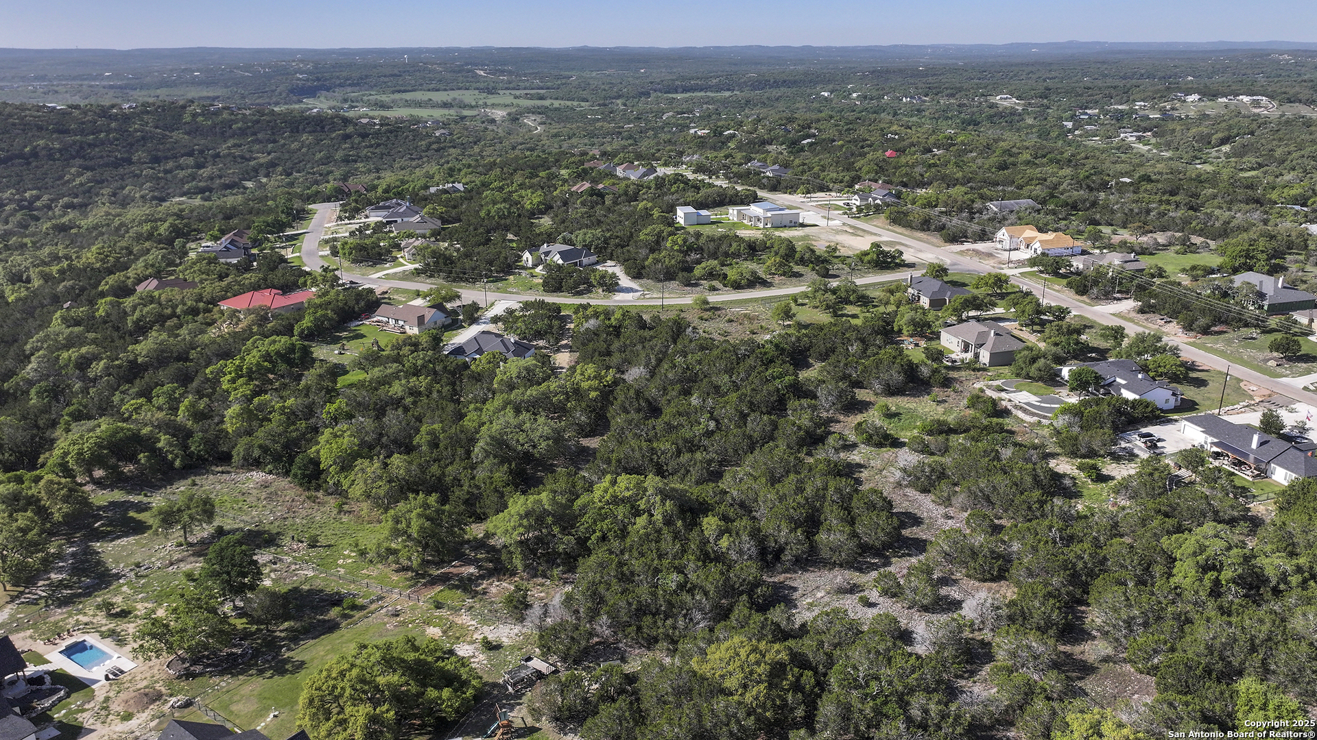 113 Alondra Lane Spring Branch, TX 78070 - Photo 19 of 25 an aerial view of residential house and green space