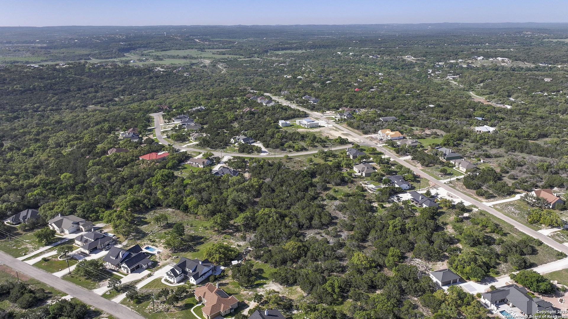 113 Alondra Lane Spring Branch, TX 78070 - Photo 9 of 25 an aerial view of town with residential houses and green space