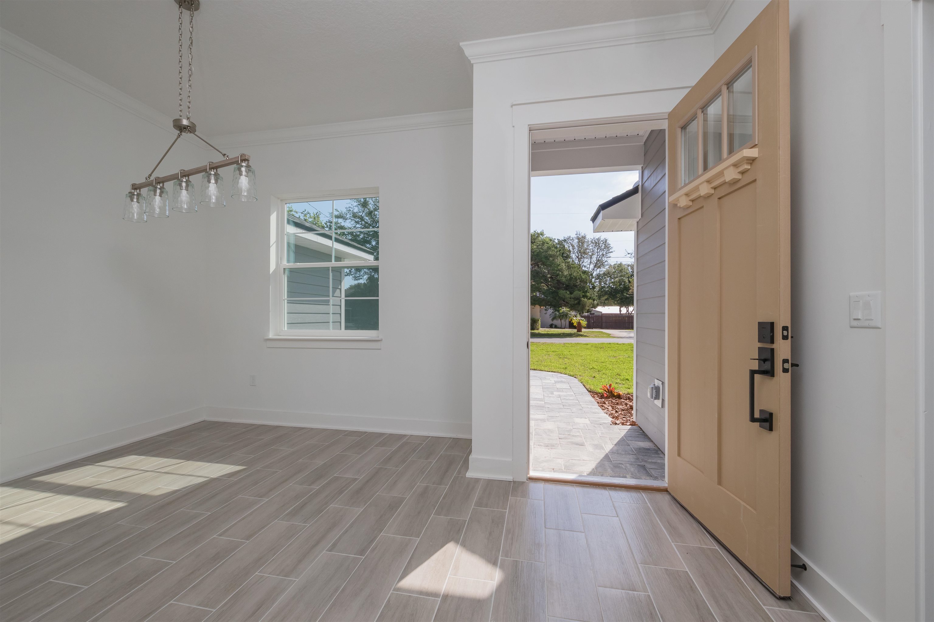 1130 Prince Road St. Augustine, FL 32086 - Photo 3 of 48 a view of empty room with wooden floor and fan