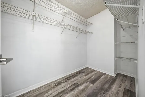 a view of a room with racks on the wall
