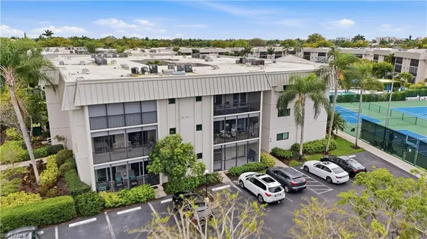 an aerial view of a house with a garden view