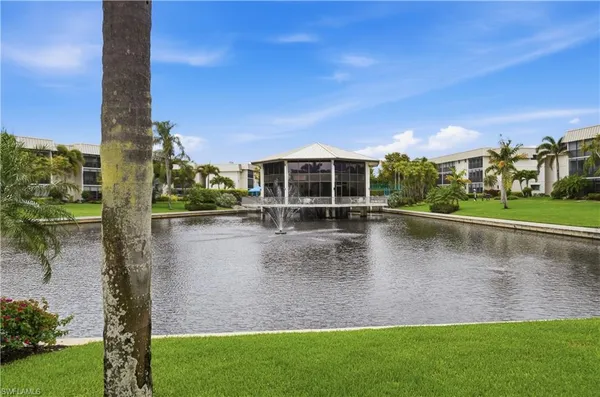 a view of a lake with a house